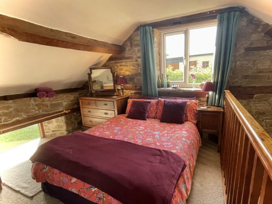 Bedroom with low window perfect for dogs