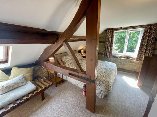 Double bedroom with feature beams